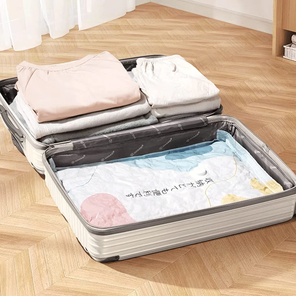 Bolsas de almacenamiento al vacío Bolsas de sellado al vacío para almacenamiento de ropa con bomba eléctrica Bolsa de compresión al vacío Reutilizable 80% más Bolsas de ahorro de espacio de almac
