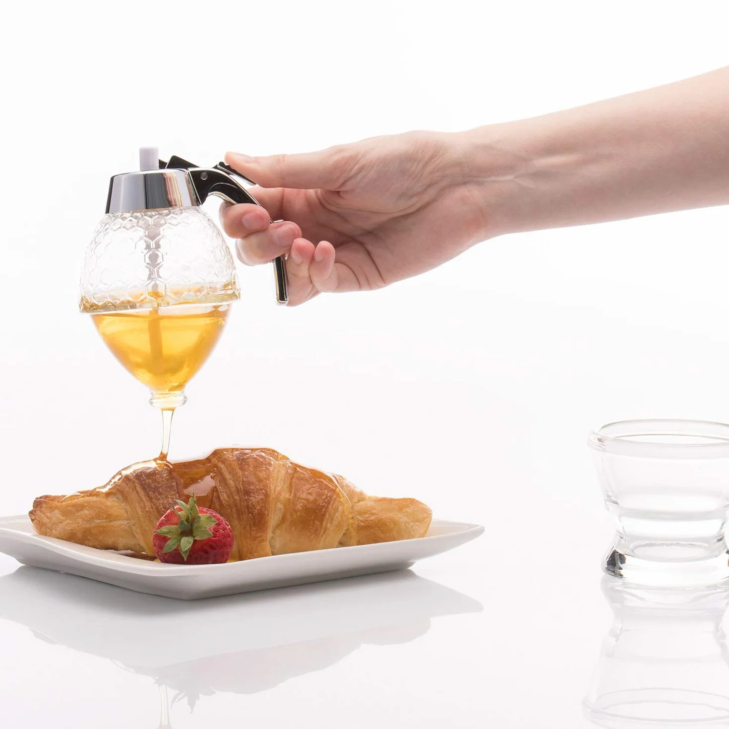 Westmark Dispensador de miel/sirope con soporte, Capacidad: 200 ml, Diseño de panal, Vidrio/plástico, de lujo, Transparente/plateado, 65132260