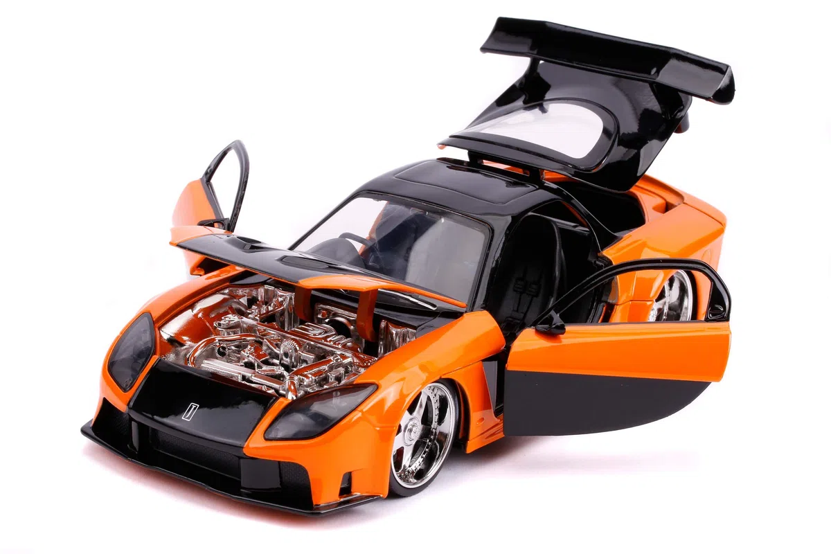 Jada Toys 253203058 Fast & Furious Han's Mazda RX-7 - Coche Tuning a Escala 1:24 con alerón, Puertas Que se abren, capó y Maletero, Rueda Libre, Color Naranja